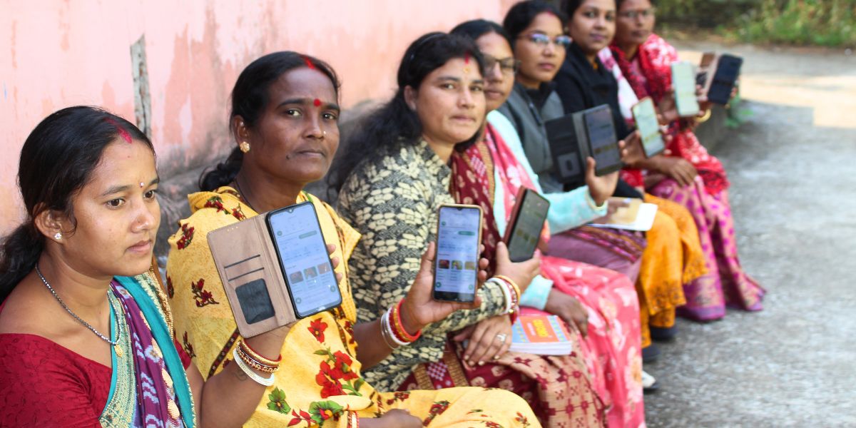Farmer in field using phone
